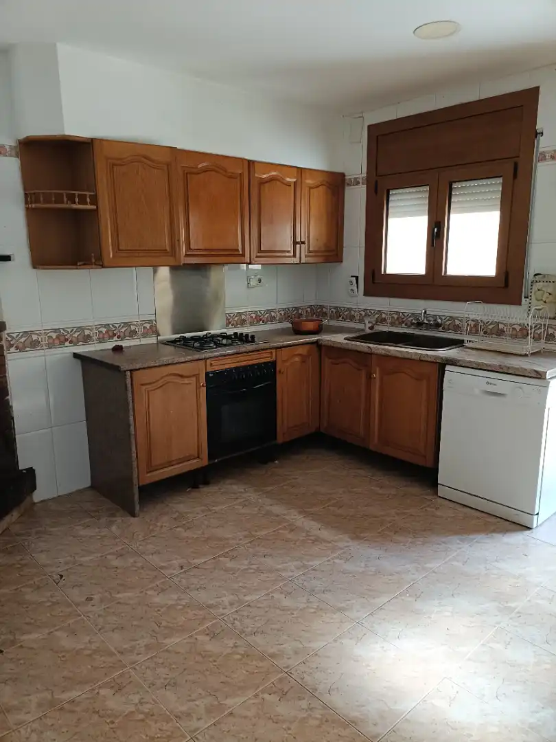 Cuina de Casa o xalet en venda en Girona amb Calefacció, Jardí privat i Parquet