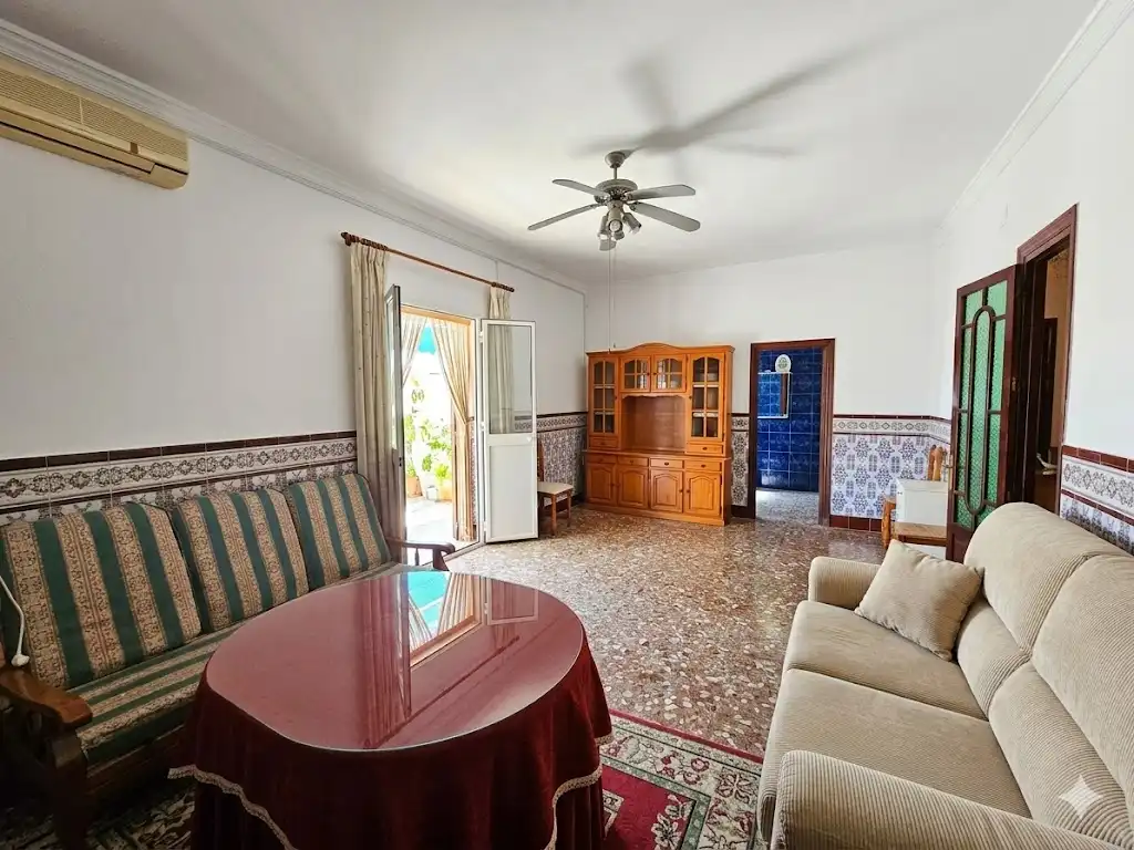 Sala de estar de Casa adosada en venta en Umbrete