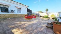 Exterior view of Country house for sale in La Puebla del Río  with Community pool