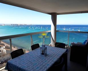 Terrassa de Àtic de lloguer en La Manga del Mar Menor amb Aire condicionat, Piscina i Balcó