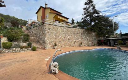 Swimming pool of House or chalet for sale in Bigues i Riells  with Air Conditioner, Heating and Private garden