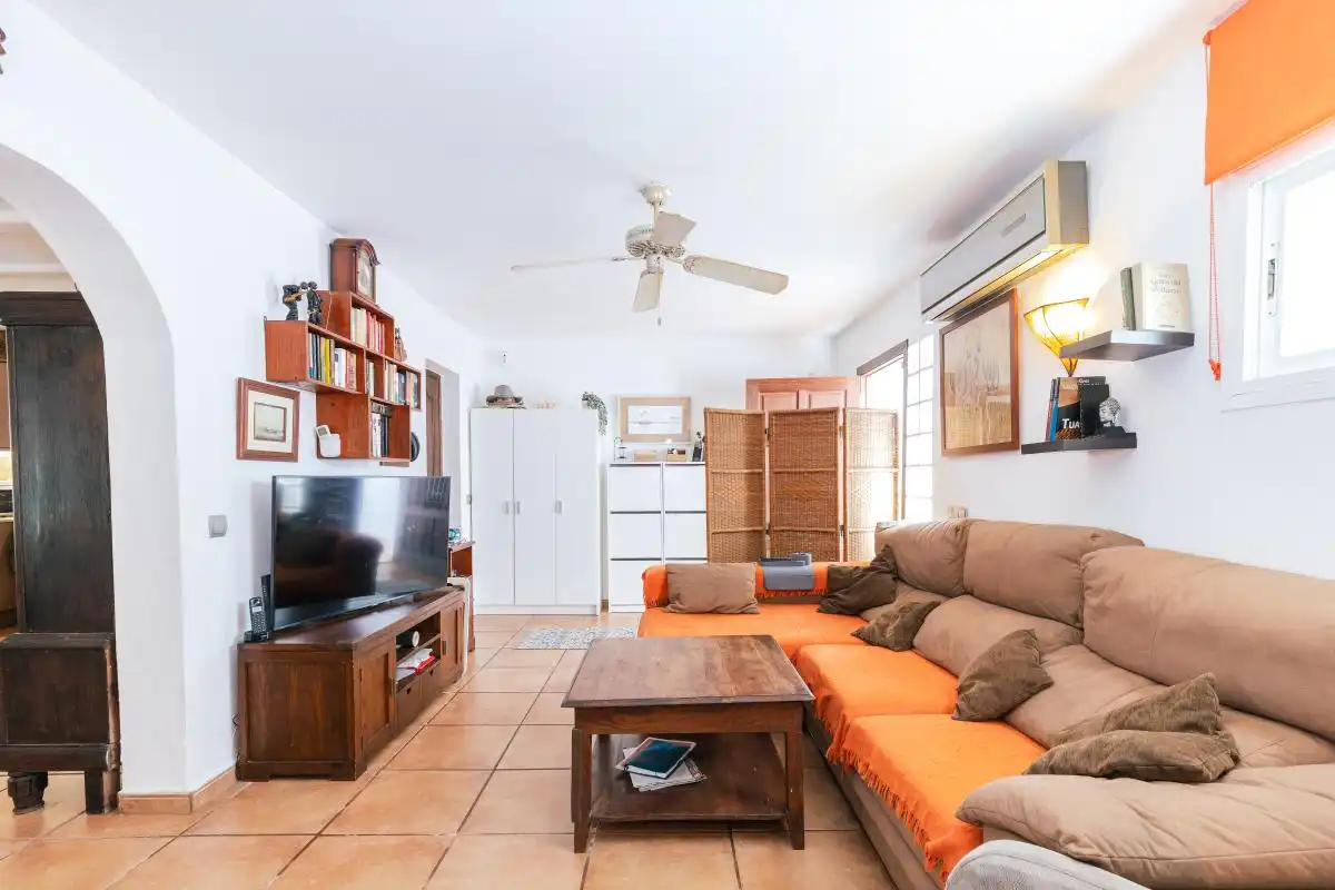 Sala d'estar de Casa adosada en venda en Sant Josep de sa Talaia amb Aire condicionat, Calefacció i Jardí privat