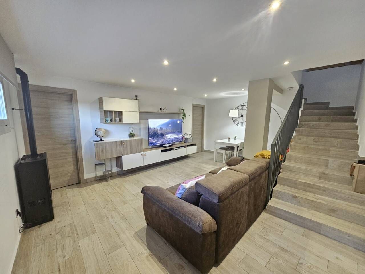 Sala d'estar de Casa o xalet en venda en Rubí amb Calefacció, Jardí privat i Parquet