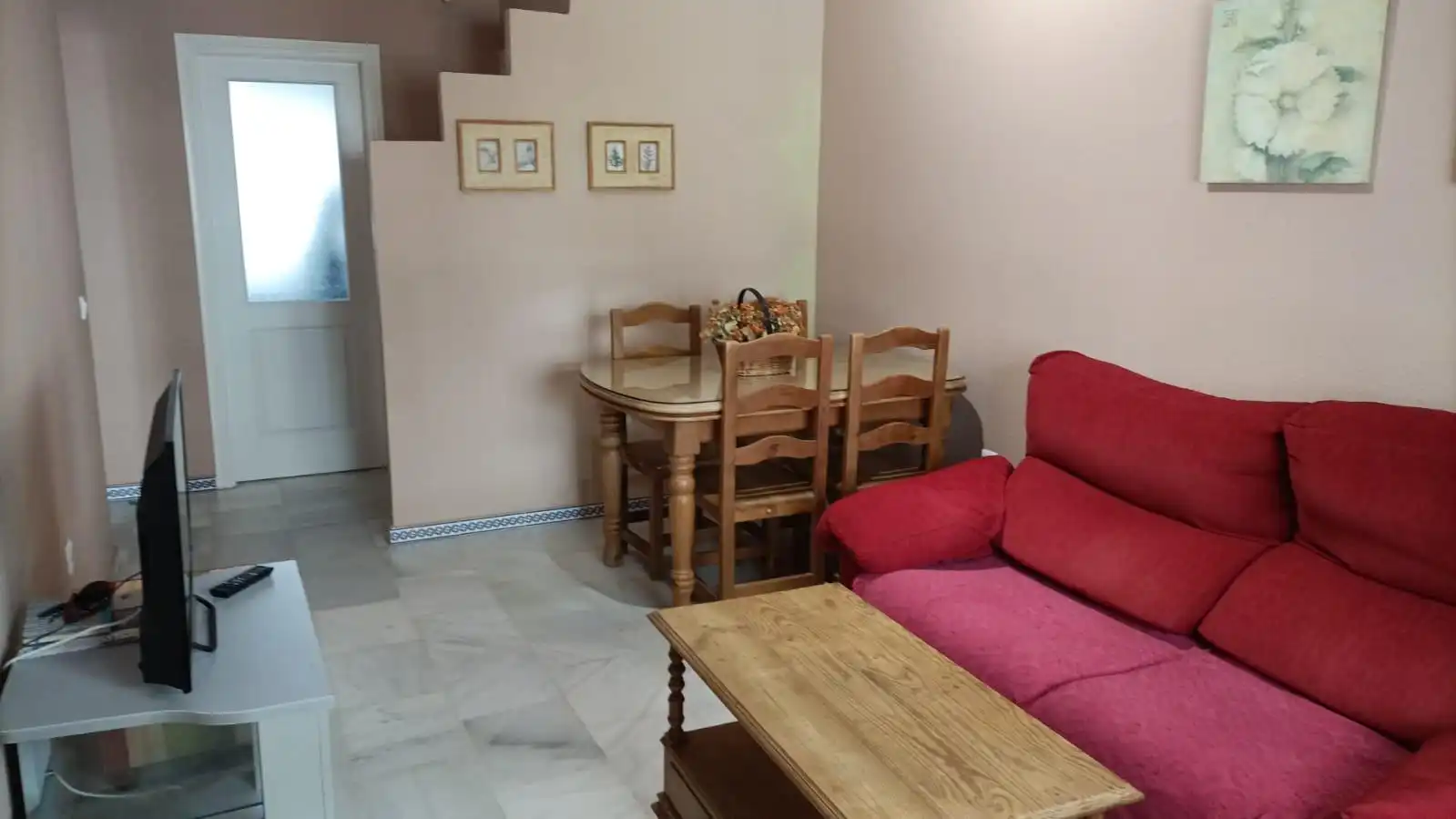 Sala d'estar de Apartament en venda en Chiclana de la Frontera amb Jardí privat, Terrassa i Moblat