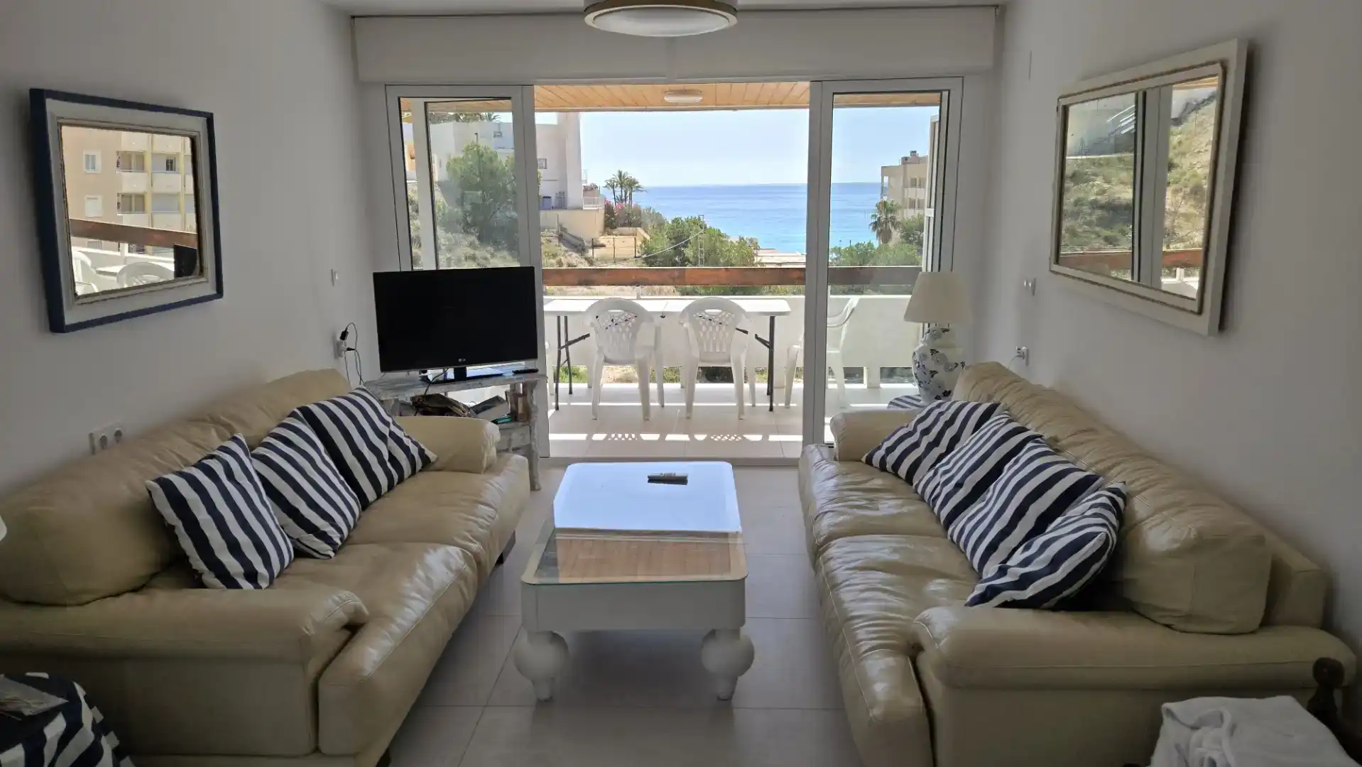 Living room of Flat for rent in El Campello  with Air Conditioner, Private garden and Swimming Pool