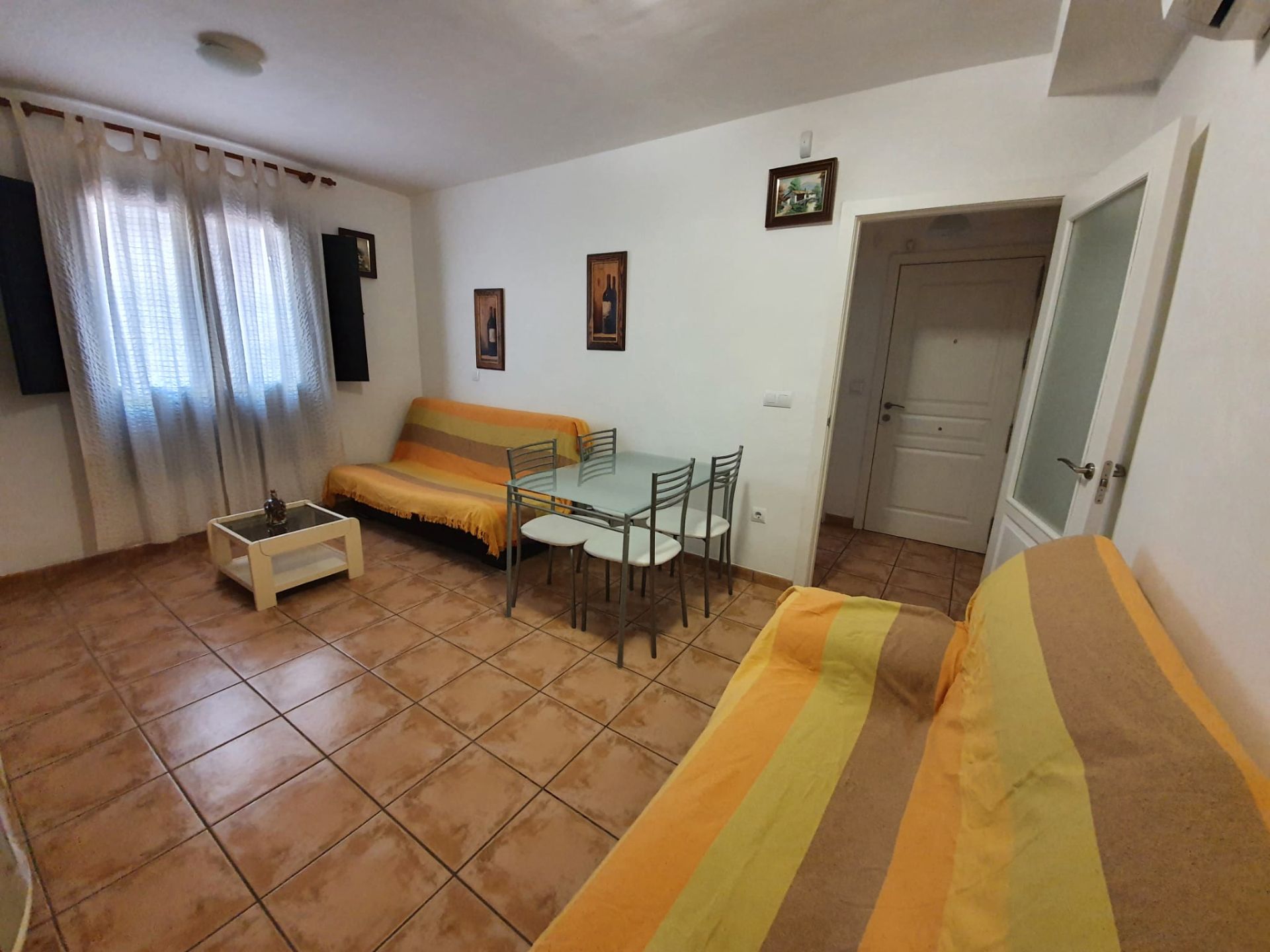 Sala d'estar de Apartament en venda en Vélez de Benaudalla amb Aire condicionat, Calefacció i Terrassa