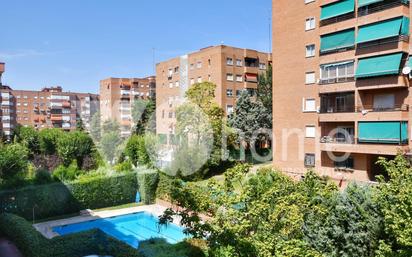 Swimming pool of Flat for sale in  Madrid Capital  with Air Conditioner, Heating and Parquet flooring