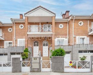 Exterior view of Single-family semi-detached for sale in El Molar (Madrid)  with Air Conditioner and Terrace