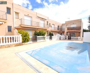 Swimming pool of Single-family semi-detached for sale in Alcanar  with Air Conditioner, Terrace and Balcony