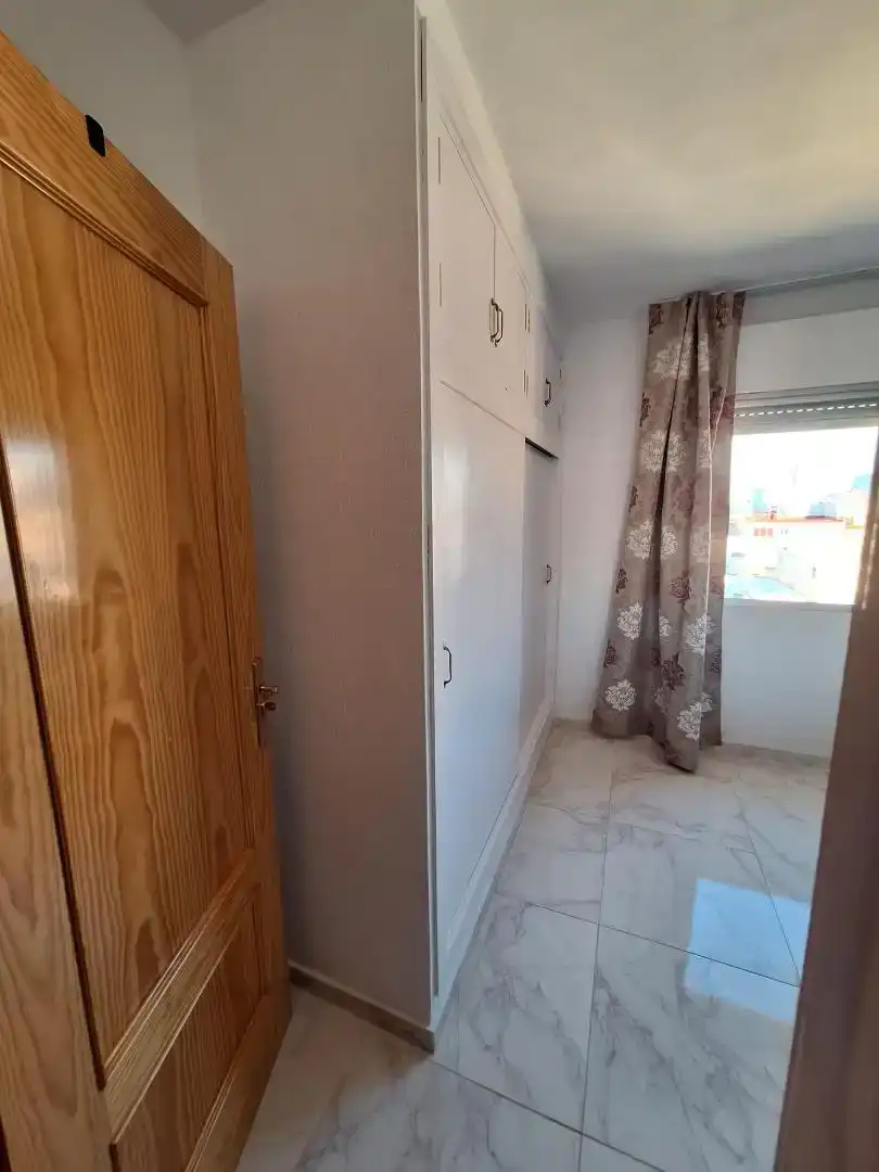 Dormitori de Apartament per a compartir en Estepona amb Moblat, Forn i Rentadora