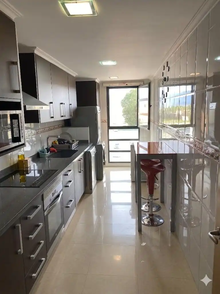Kitchen of Flat for sale in Sueca  with Air Conditioner, Storage room and Balcony