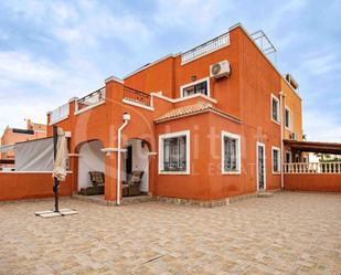 Exterior view of Single-family semi-detached for sale in Los Montesinos  with Air Conditioner, Private garden and Furnished