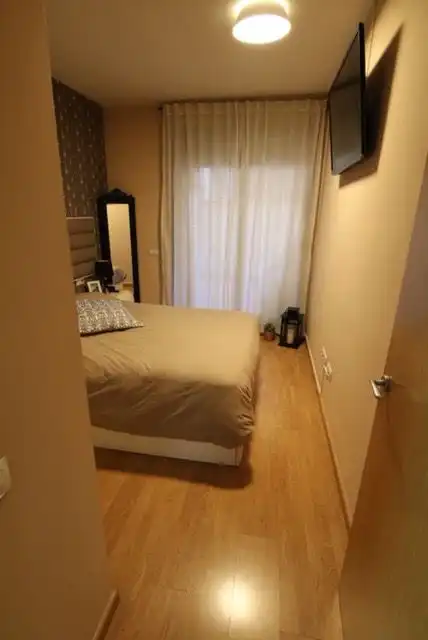 Schlafzimmer von Wohnung zur Miete in Sud