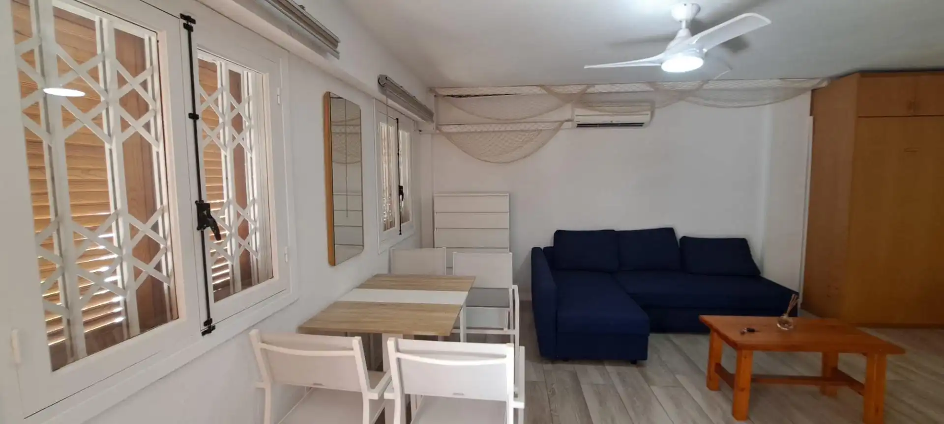 Sala d'estar de Loft de lloguer en Santa Pola amb Aire condicionat, Jardí privat i Terrassa