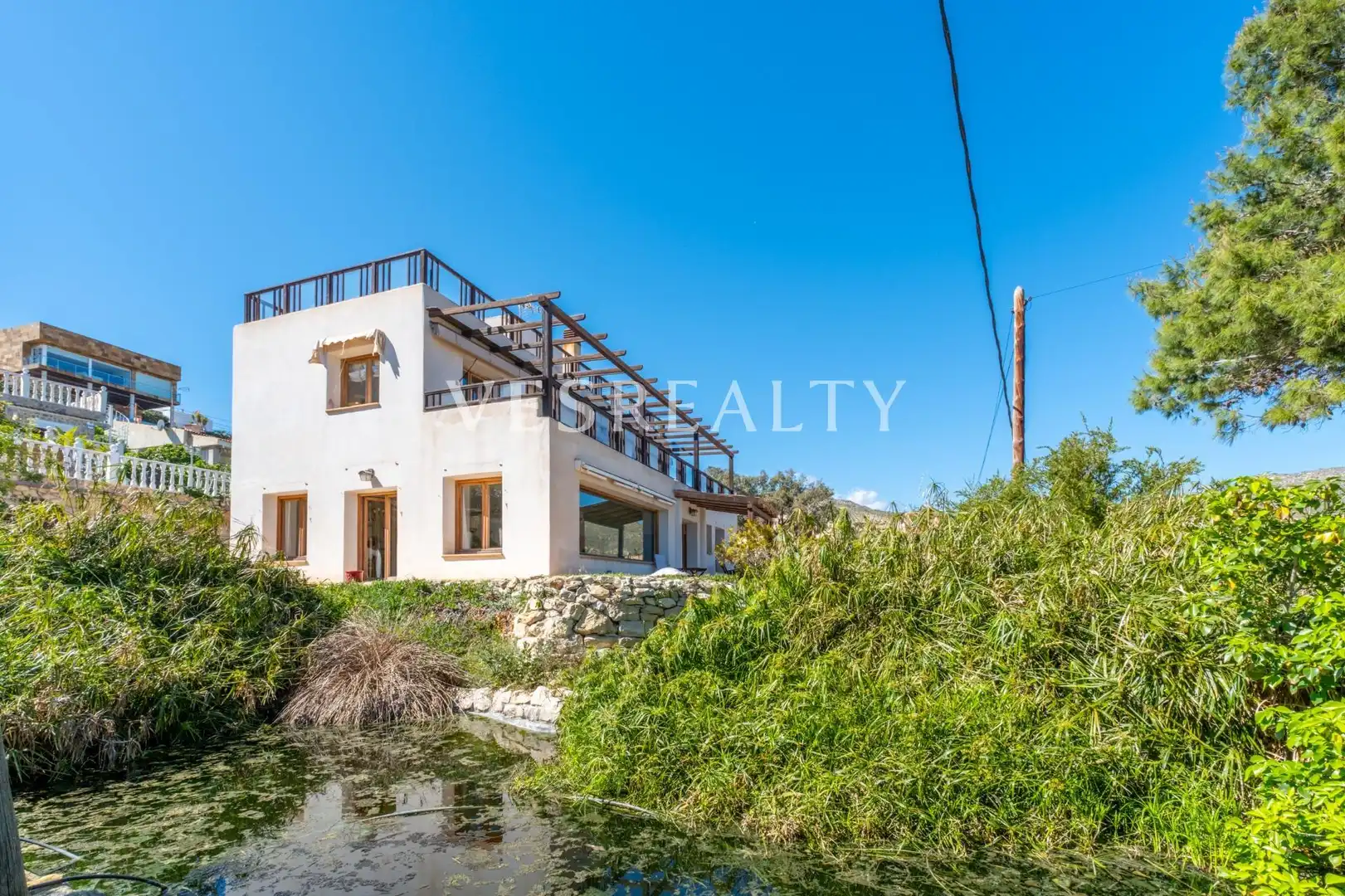 Vista exterior de Casa o xalet en venda en El Campello amb Calefacció, Jardí privat i Terrassa