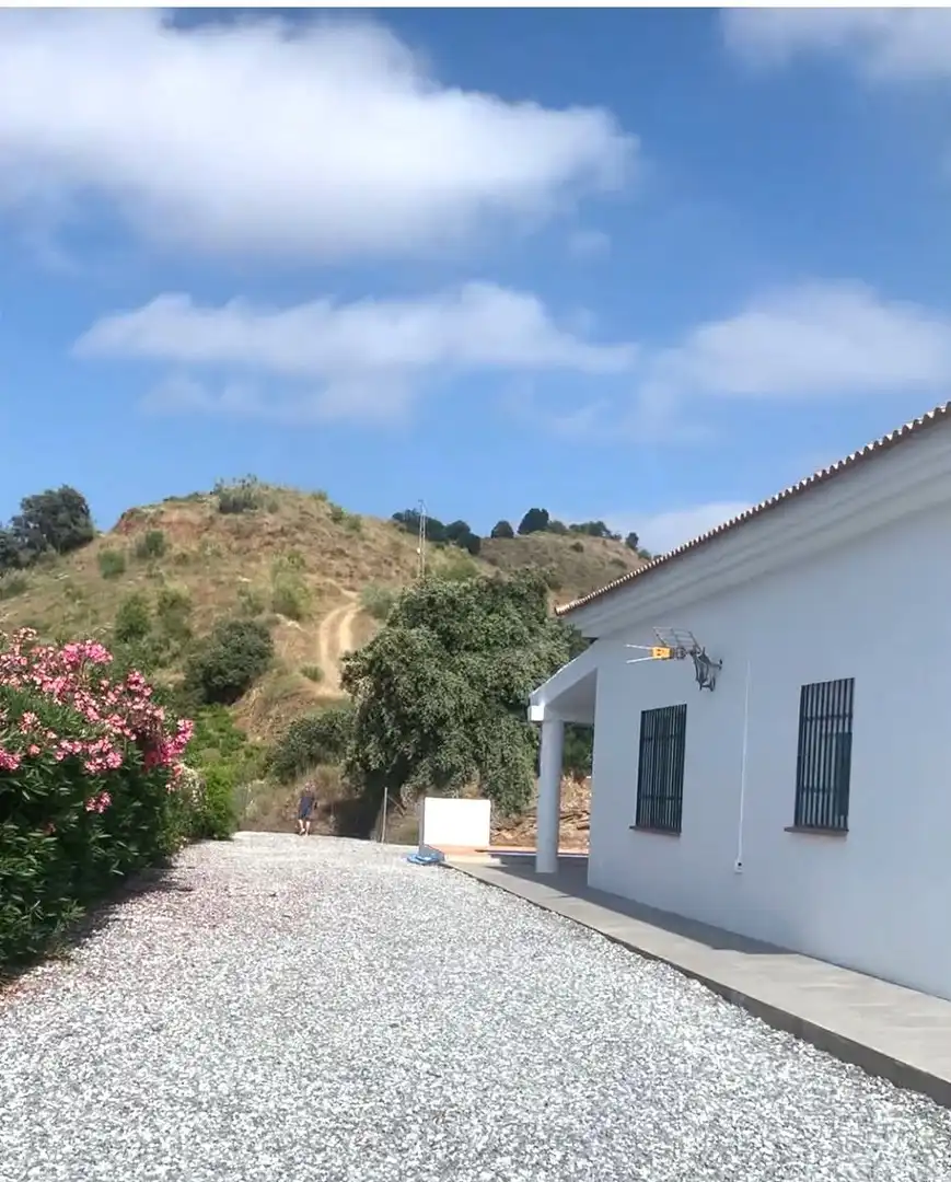 Vista exterior de Finca rústica en venda en El Borge amb Jardí privat, Terrassa i Traster
