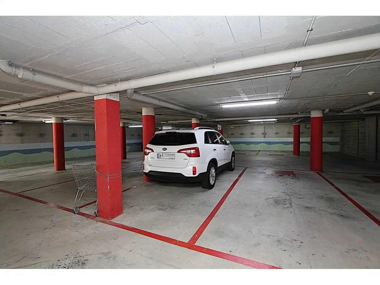 Parkplatz von Wohnung zum Verkauf in Lloret de Mar mit Klimaanlage, Heizung und Privatgarten