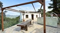 Terrace of House or chalet for sale in Puigpunyent  with Air Conditioner, Heating and Private garden