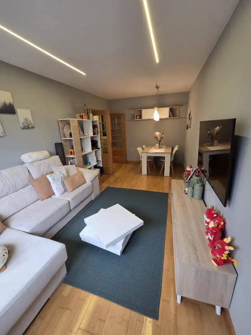 Living room of Flat for sale in Gijón   with Heating, Private garden and Parquet flooring