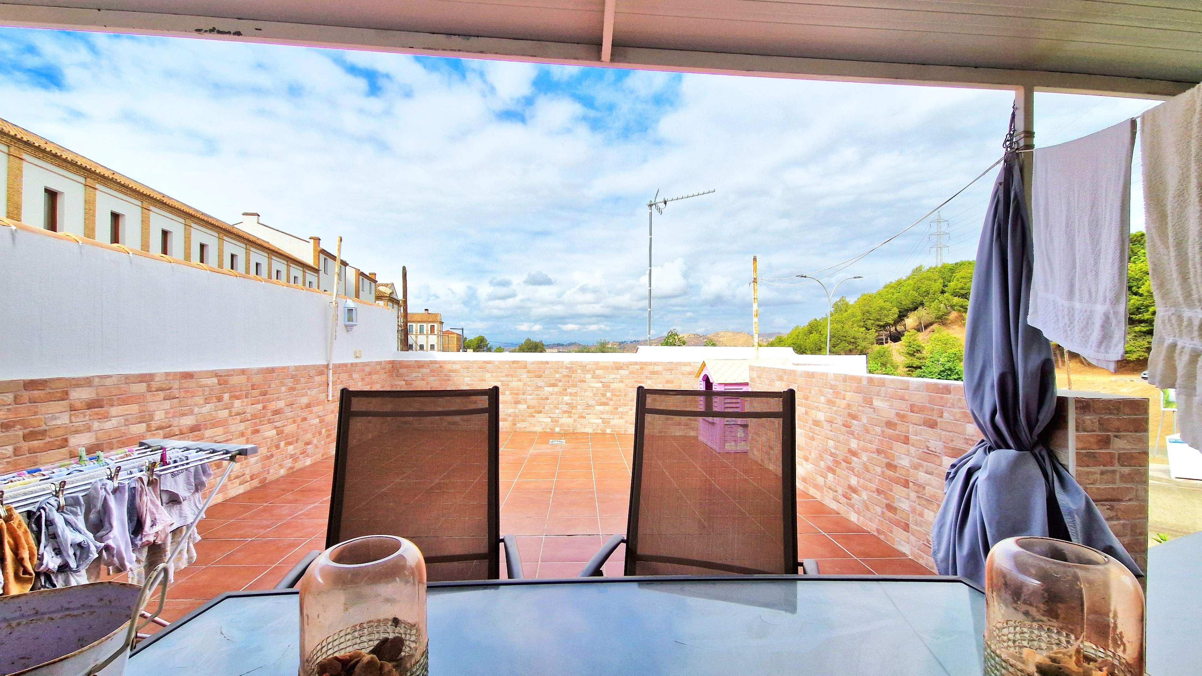 Exterior view of House or chalet for sale in Málaga Capital  with Air Conditioner, Terrace and Storage room