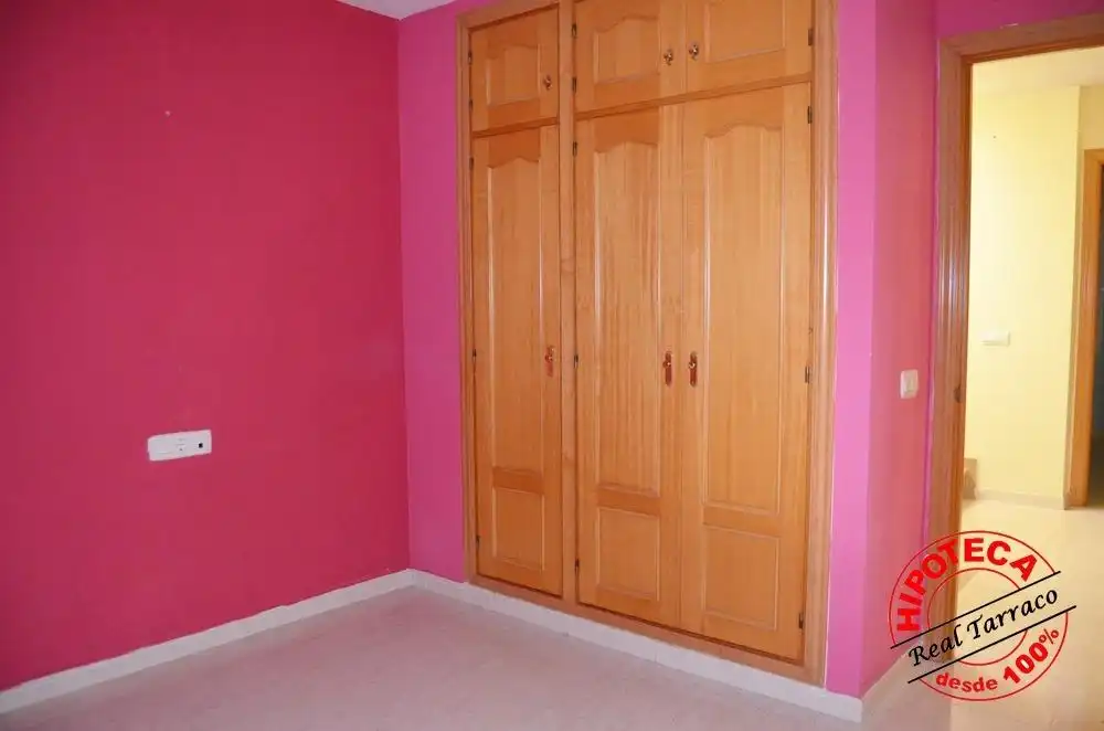 Habitación de Casa adosada en venta en Calafell con Piscina comunitaria