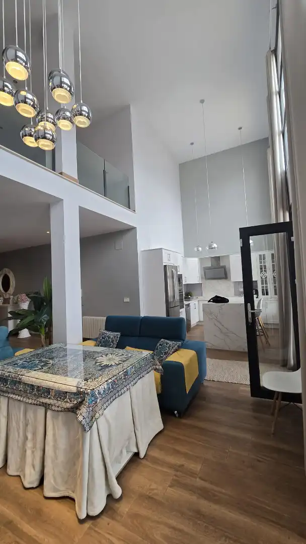 Sala d'estar de Casa adosada en venda en Úbeda amb Aire condicionat, Calefacció i Jardí privat