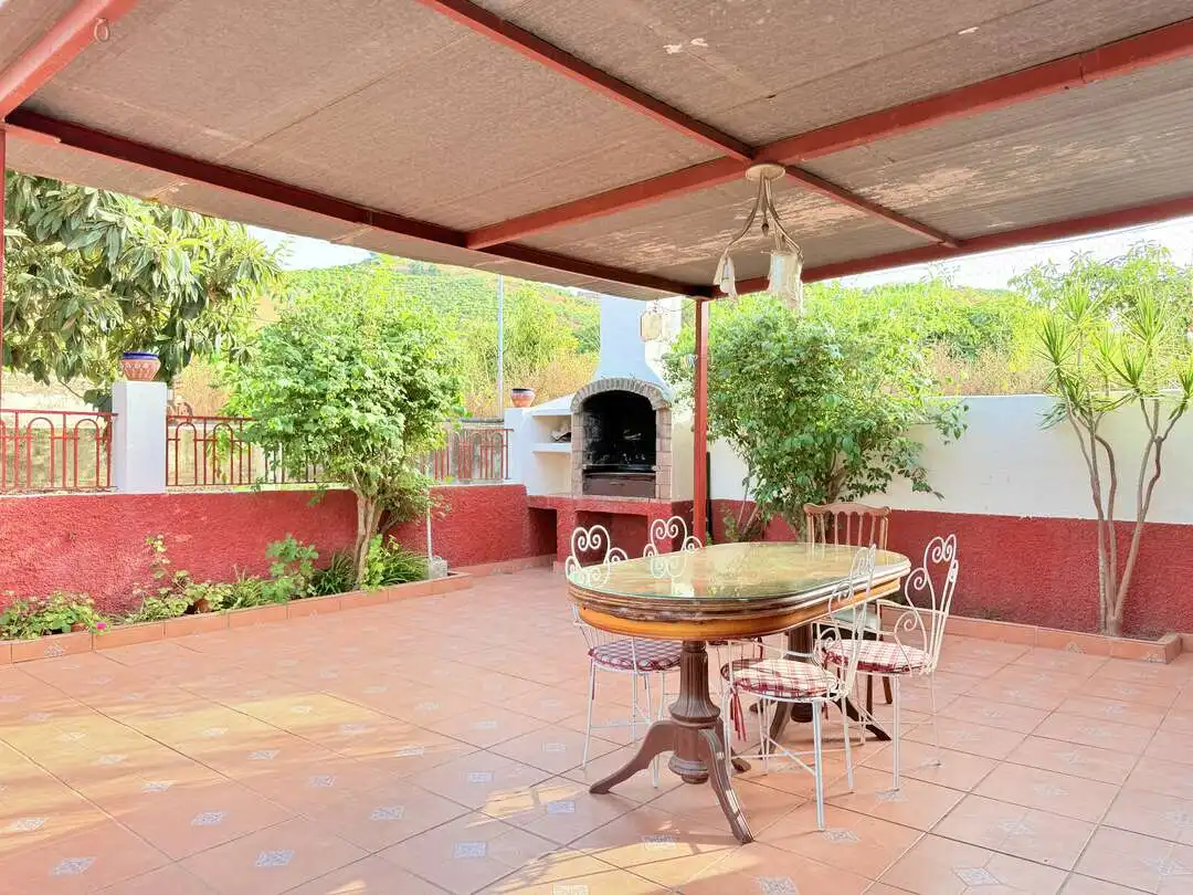 Terrassa de Casa o xalet en venda en Benamocarra amb Jardí privat i Moblat