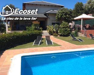 Vista exterior de Casa o xalet en venda en Corbera de Llobregat amb Aire condicionat, Terrassa i Piscina