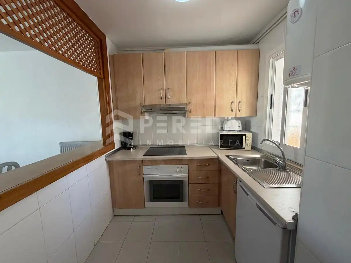 Cocina de Apartamento en venta en Roquetas de Mar con Aire acondicionado, Jardín privado y Terraza