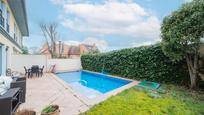 Swimming pool of Single-family semi-detached for sale in Pozuelo de Alarcón  with Air Conditioner, Heating and Private garden