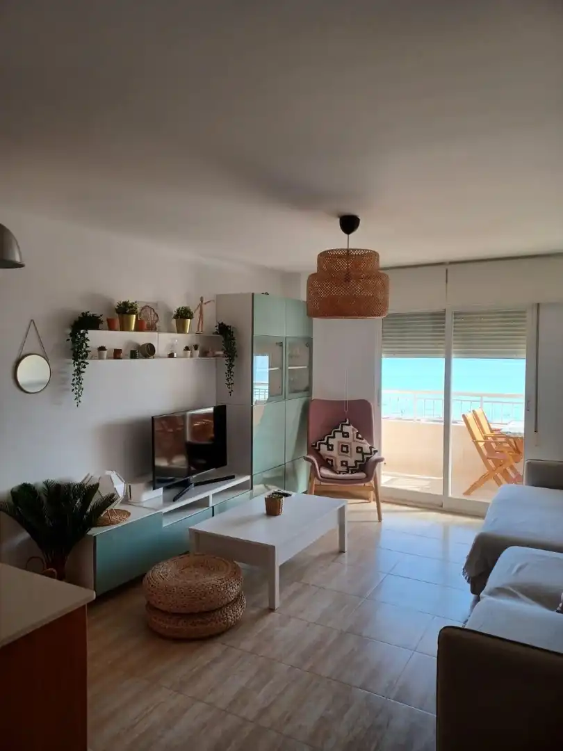 Sala d'estar de Apartament de lloguer en La Manga del Mar Menor amb Aire condicionat, Calefacció i Piscina