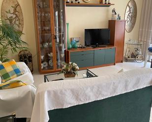 Sala d'estar de Pis de lloguer en Tossa de Mar amb Aire condicionat, Jardí privat i Terrassa