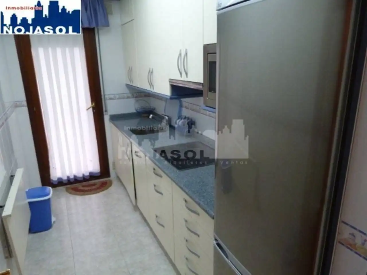 Cuina de Apartament de lloguer en Noja amb Calefacció, Jardí privat i Terrassa