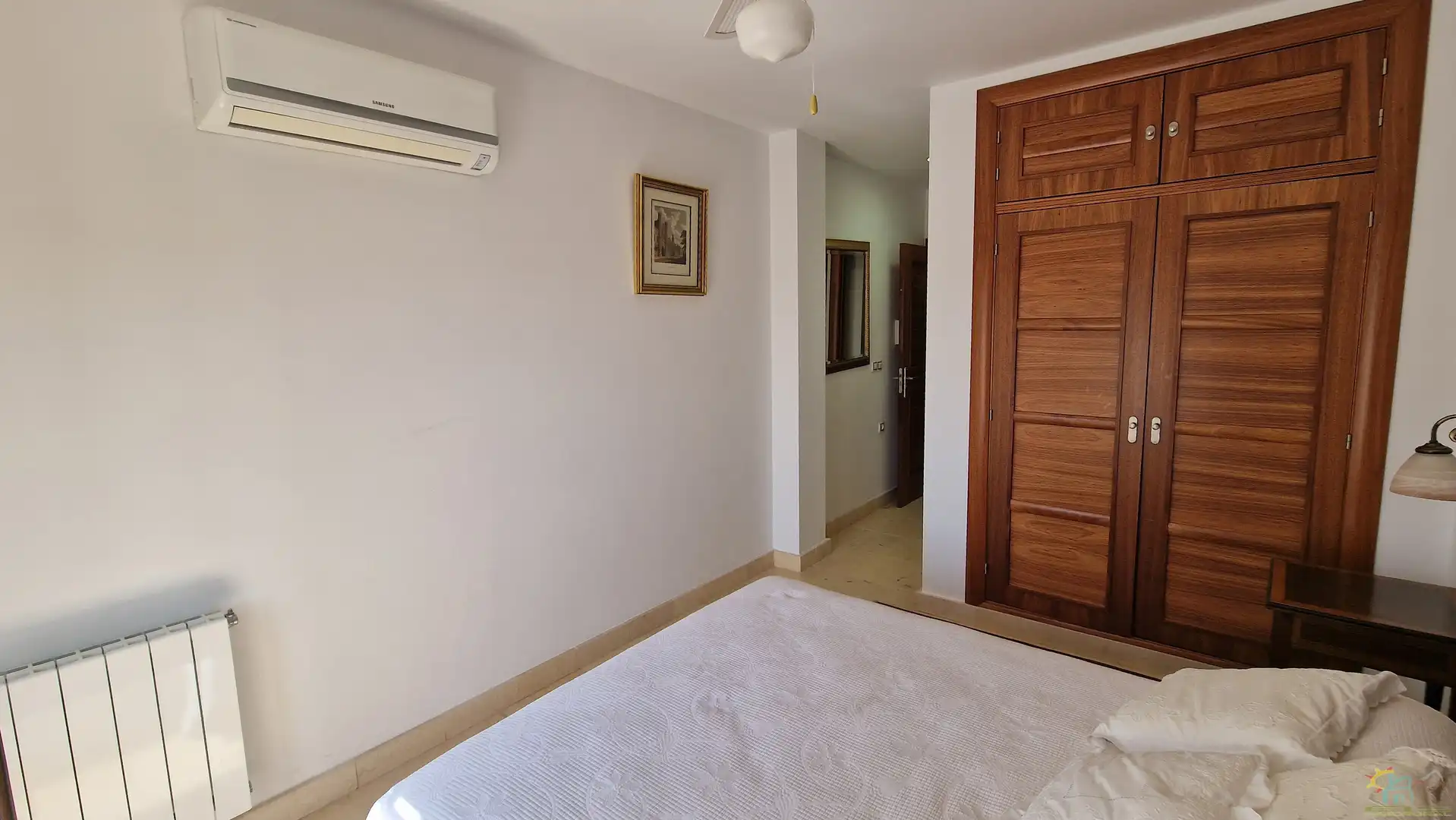 Schlafzimmer von Einfamilien-Reihenhaus zum Verkauf in Diezma mit Klimaanlage, Heizung und Privatgarten