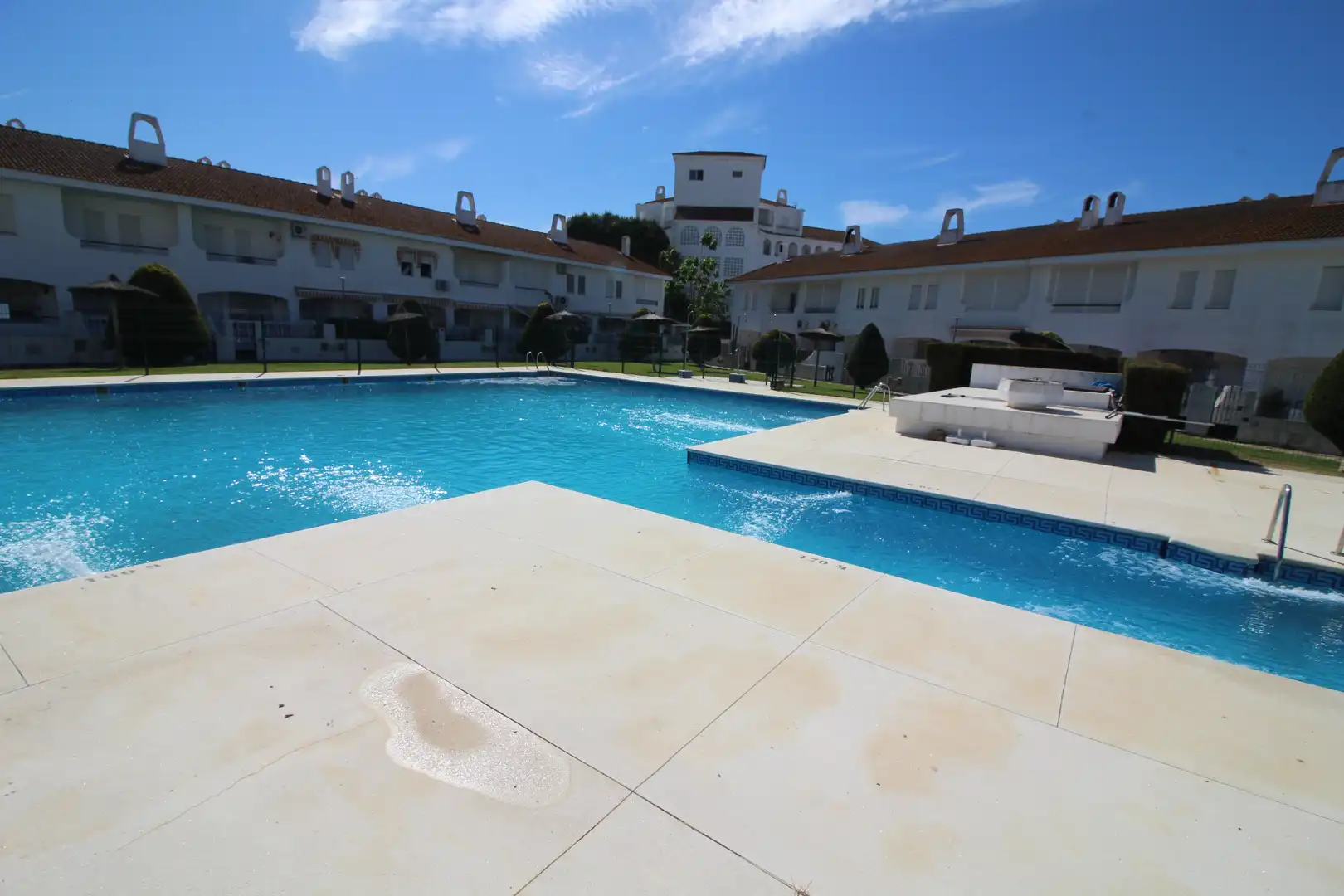 Swimming pool of Detached homes for sale in El Portil  with Terrace, Storage room and Community pool