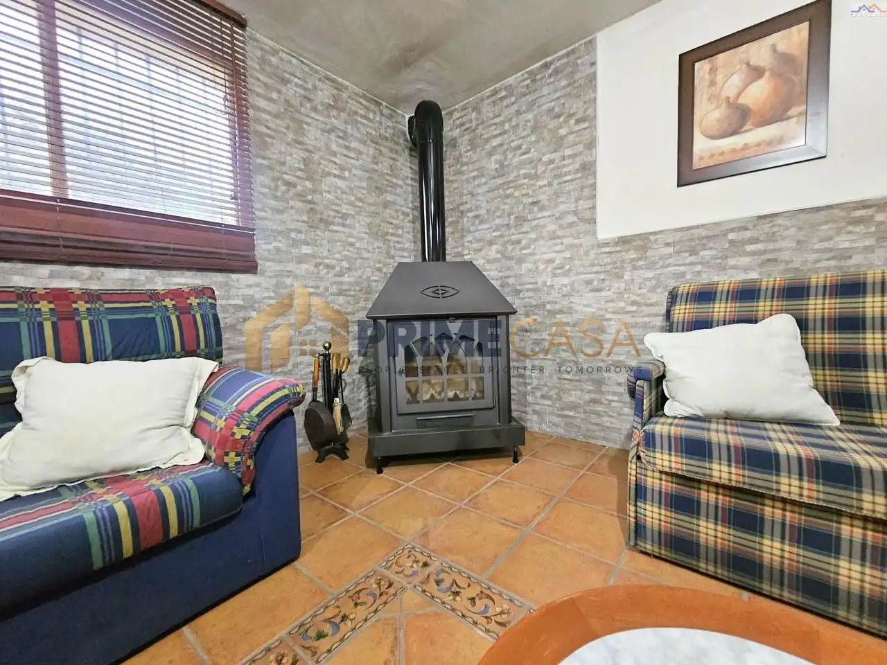 Sala de estar de Casa o chalet en venta en Villa del Prado, Madrid