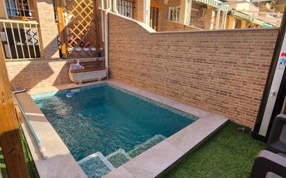 Swimming pool of Single-family semi-detached for sale in San Javier  with Air Conditioner, Heating and Private garden