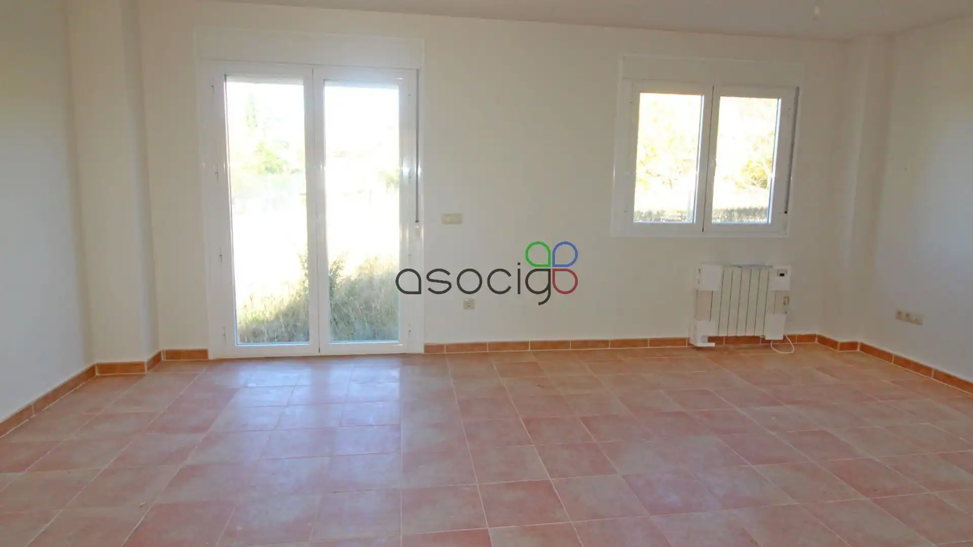 Sala de estar de Casa adosada en venta en Albalate de Zorita con Calefacción y Jardín privado