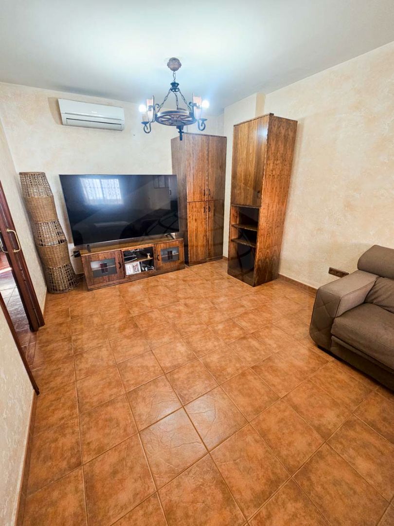 Sala d'estar de Casa adosada en venda en Cártama