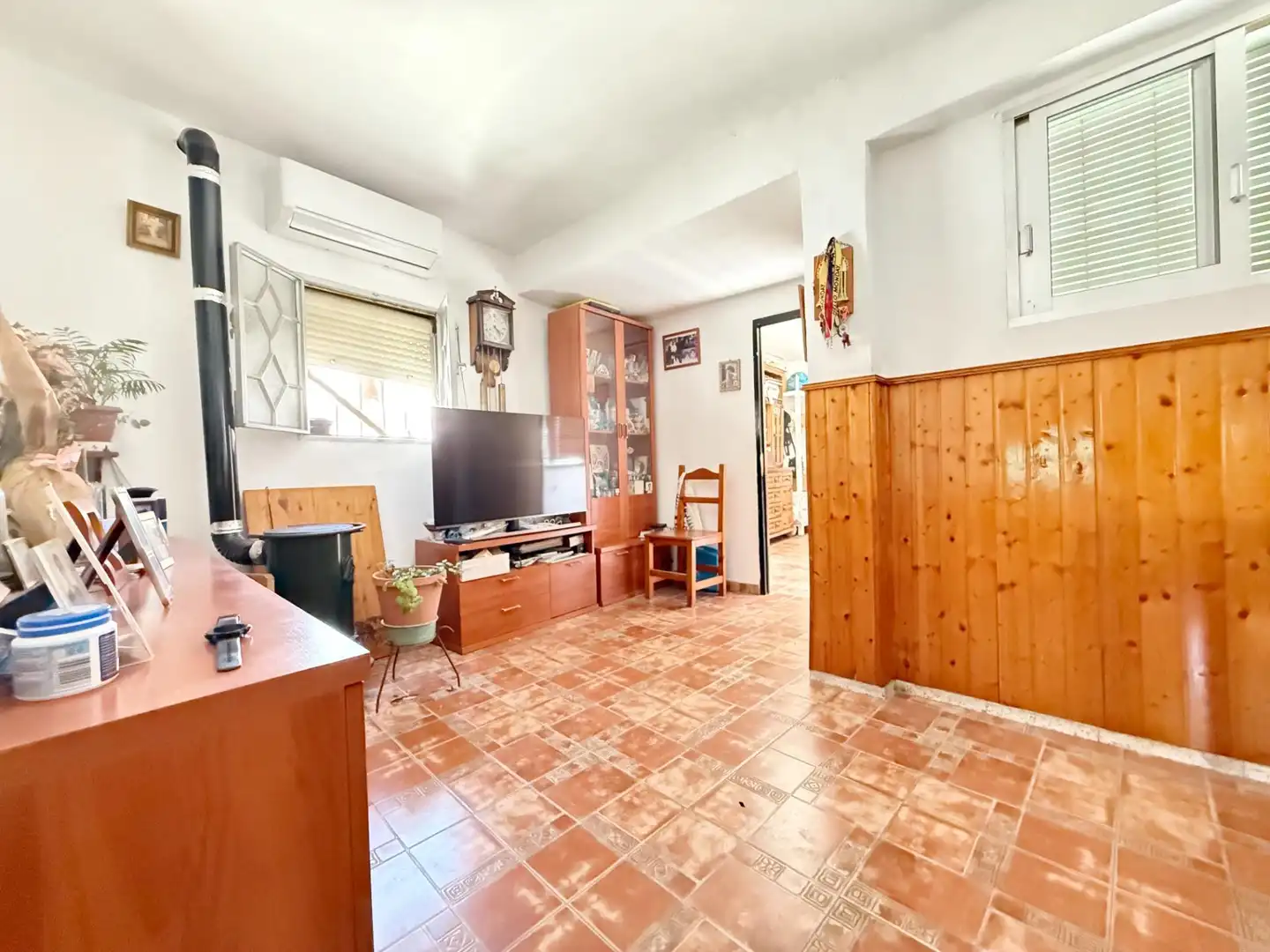 Sala d'estar de Casa adosada en venda en Sevilla