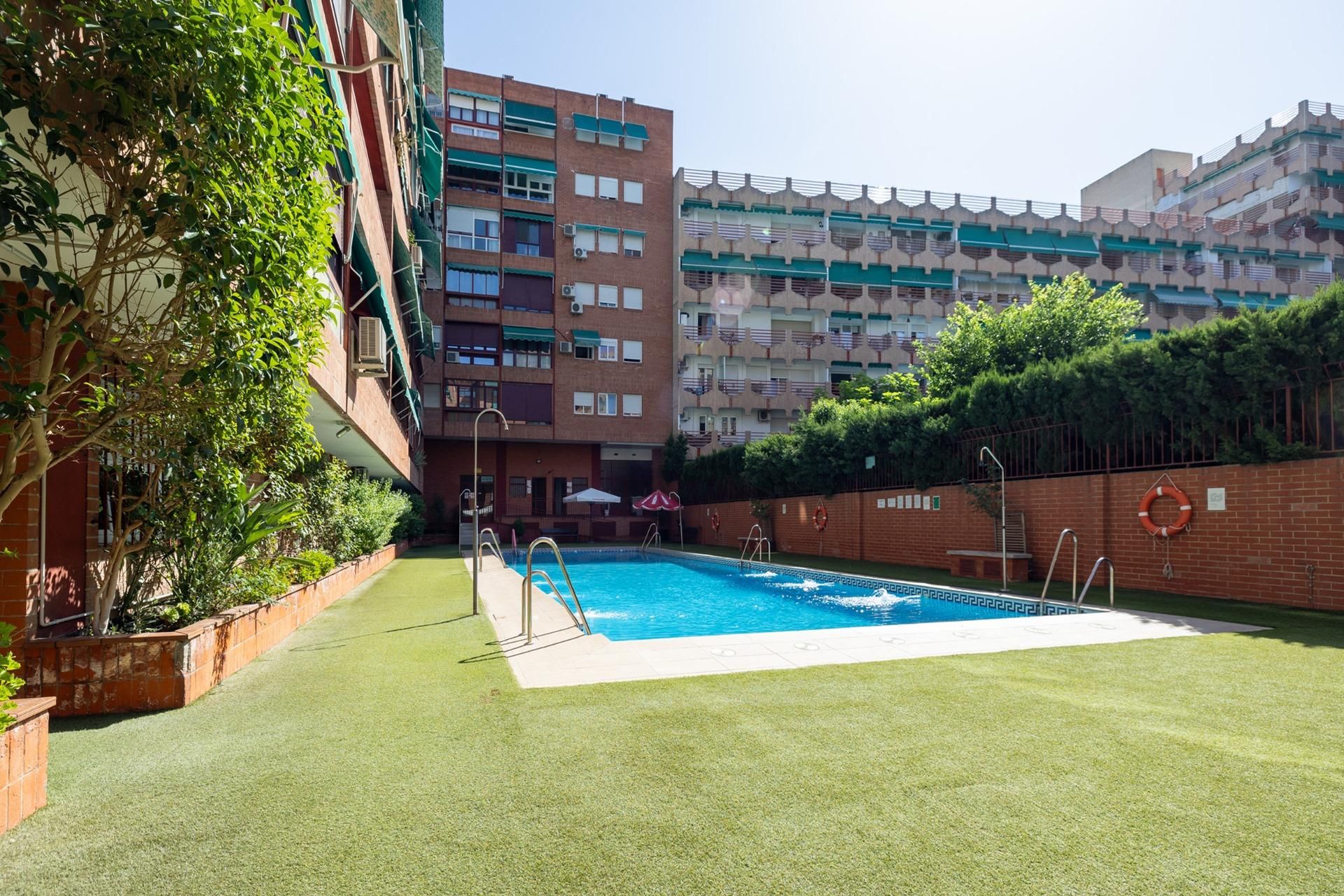 Swimming pool of Flat for sale in  Granada Capital  with Heating and Community pool