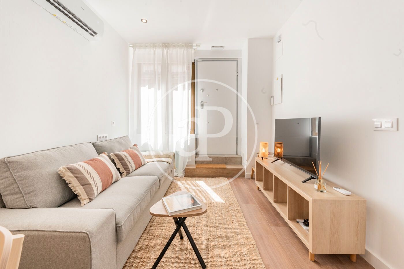 Wohnzimmer von Wohnung zum verkauf in Escopete mit Klimaanlage, Heizung und Privatgarten