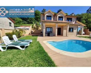 Exterior view of House or chalet for sale in Marín  with Swimming Pool