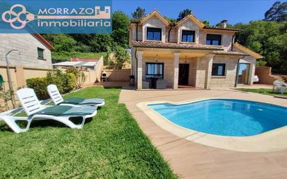 Exterior view of House or chalet for sale in Marín  with Swimming Pool