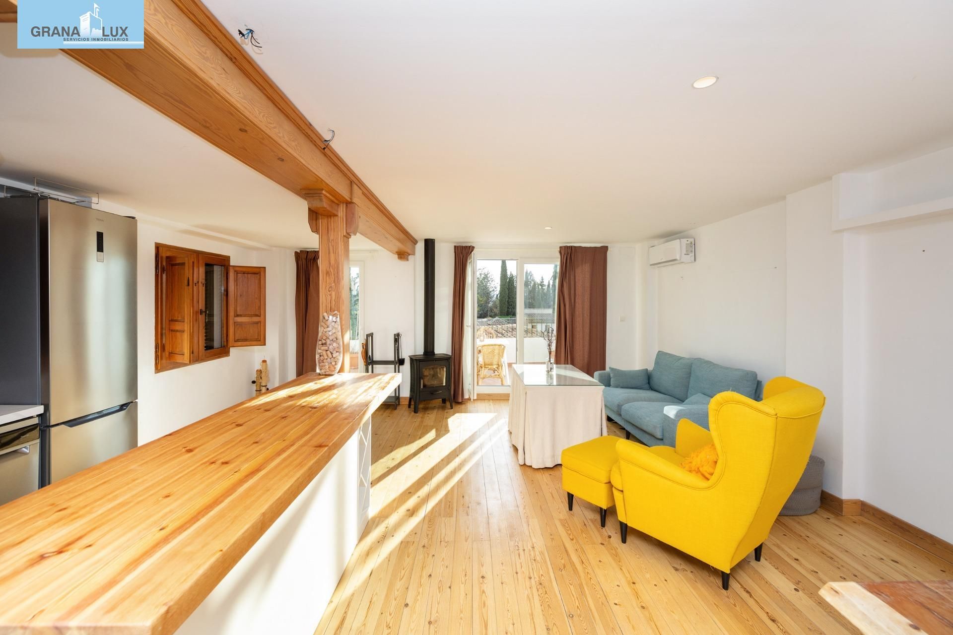 Sala de estar de Casa adosada en venta en  Granada Capital con Terraza