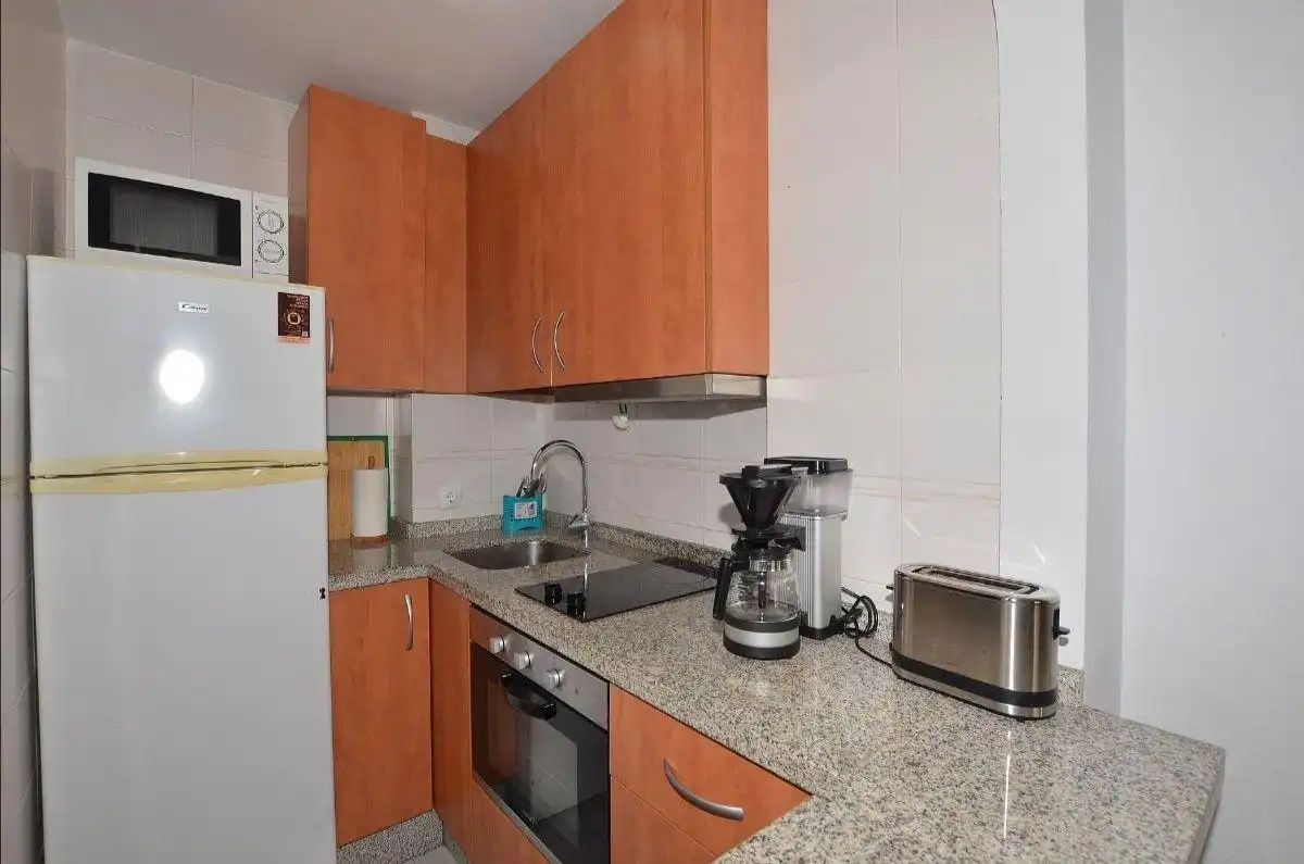 Cuina de Apartament en venda en Benalmádena amb Aire condicionat, Terrassa i Piscina comunitària