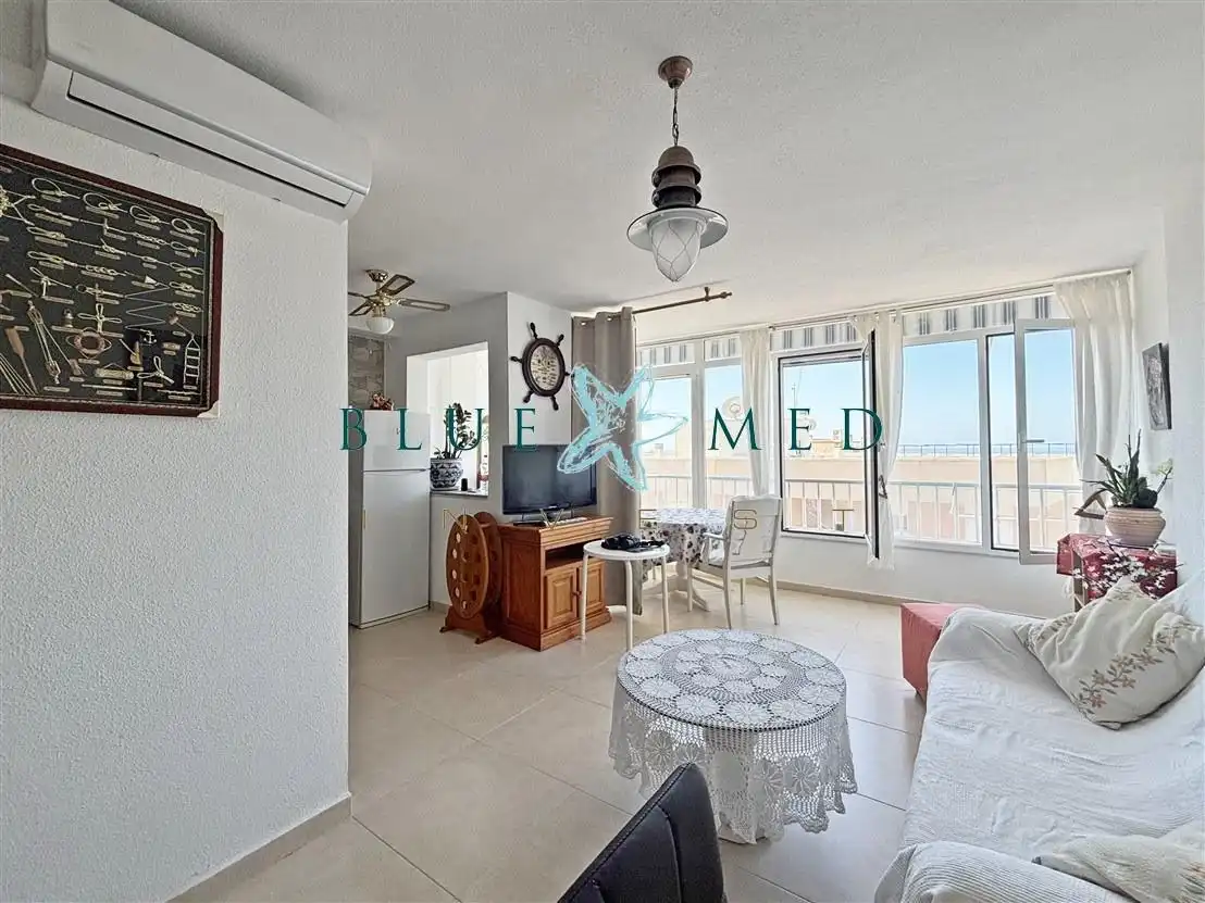Sala d'estar de Apartament en venda en Mazarrón amb Aire condicionat, Terrassa i Moblat