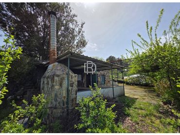 Casa rústica amb jardí en venda a Camino Reventón
