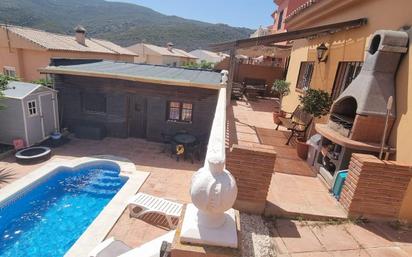 Exterior view of Single-family semi-detached for sale in La Línea de la Concepción  with Private garden, Swimming Pool and Balcony
