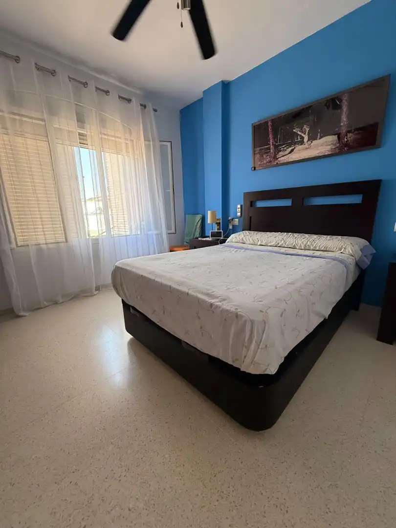 Dormitori de Casa adosada en venda en Bollullos de la Mitación amb Jardí privat